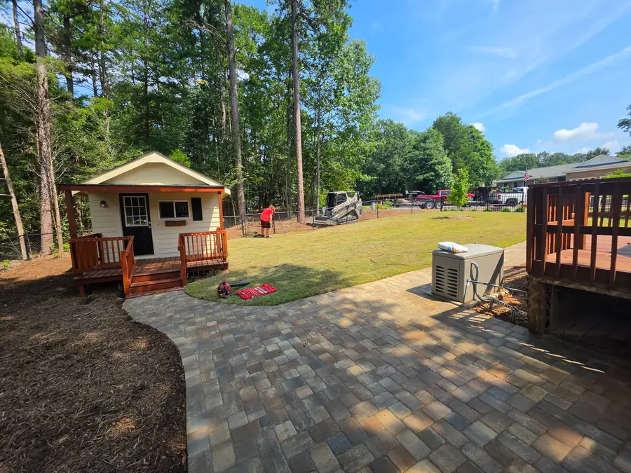 Curved paver walkway installation from a deck staircase in Kannapolis, NC