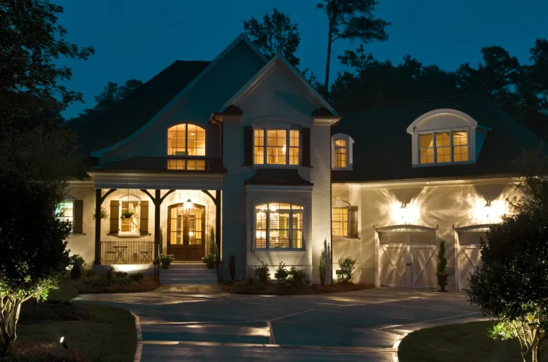 Architectural uplighting on a home's exterior at night